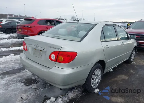 2003 Toyota Corolla Le z USA, uszkodzony, nr VIN JTDBR32EX32012593